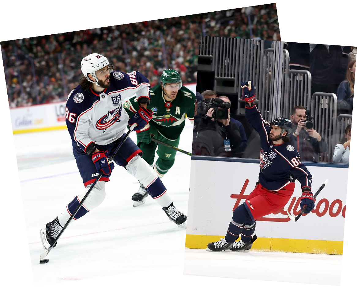 Marchenko wearing Columbus Blue Jacket Navy Jersey during hockey game